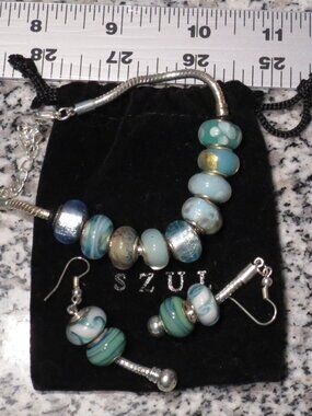 New/never worn Szul Bracelet and Earring Set Blues/Teals